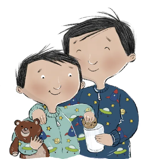 Dad and son in pajamas eating milk and cookies