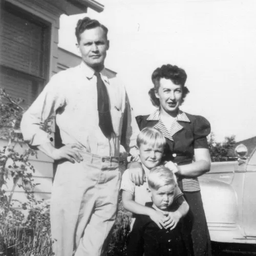 Jeffrey R. Holland with his parents and brother