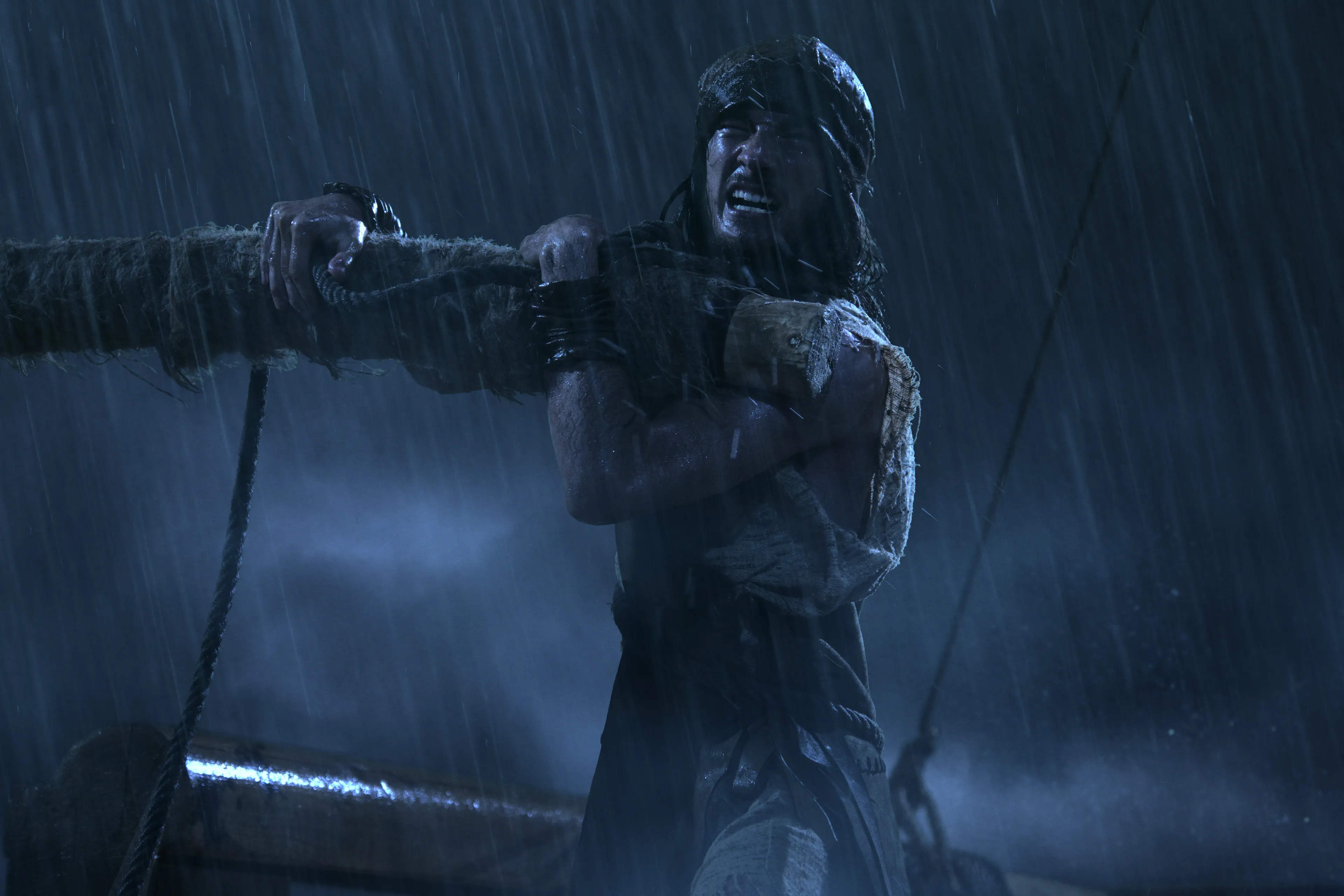 Sam guides the ship during the storm.