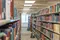 Aisles and rows of bookshelves full of books, at the Family History Library in Salt Lake City, Utah. (horiz)