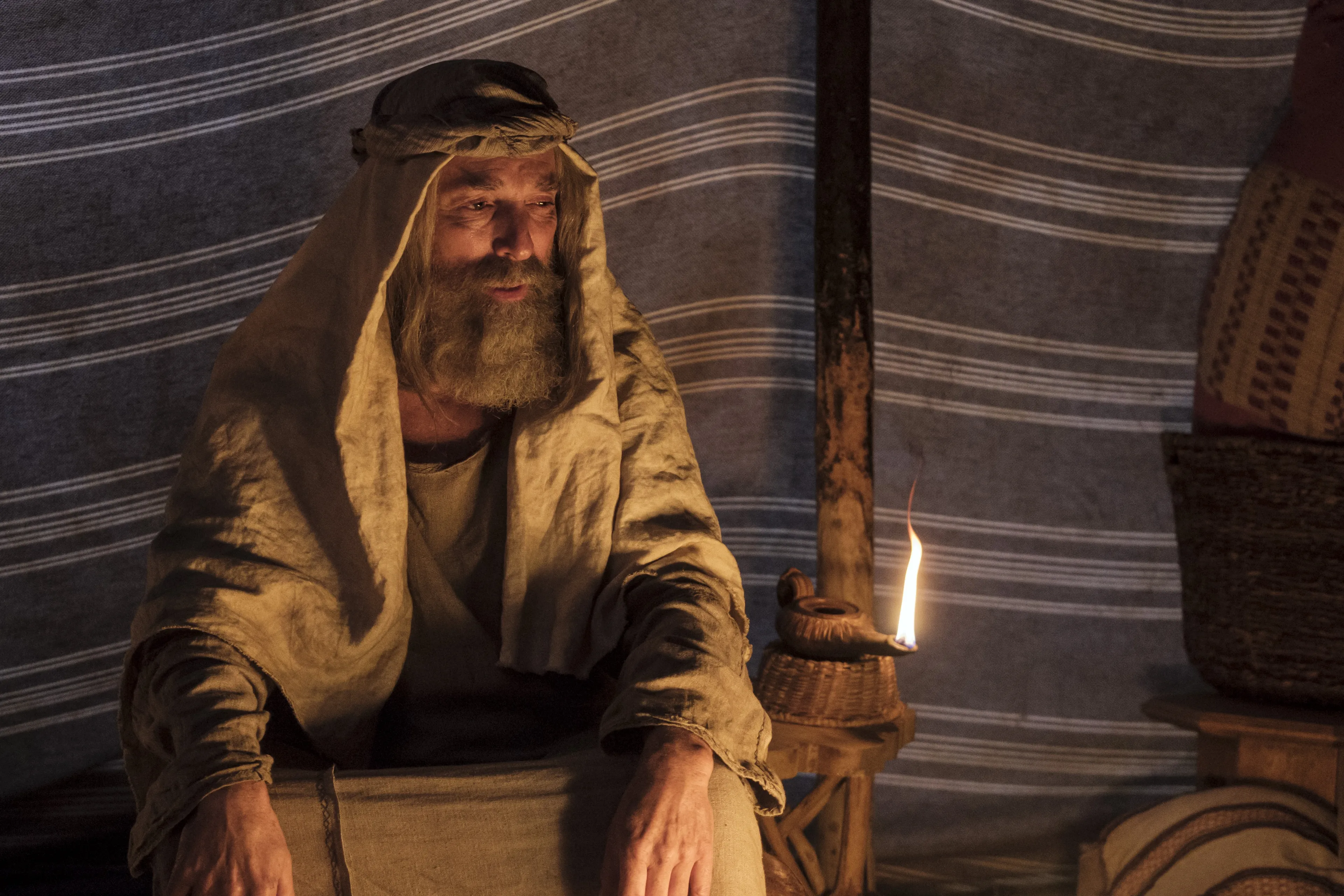 Lehi tells his family about his vision of the tree of life.