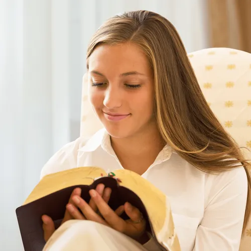 young woman reading scriptures