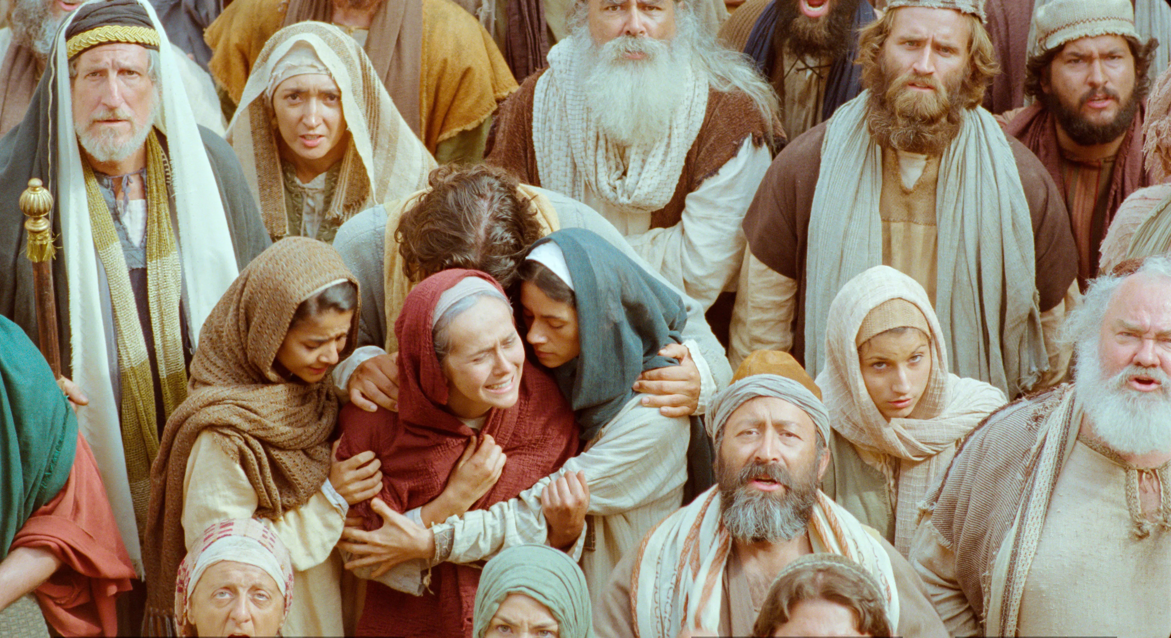 Mary is supported as she cries when Christ is condemned to death.