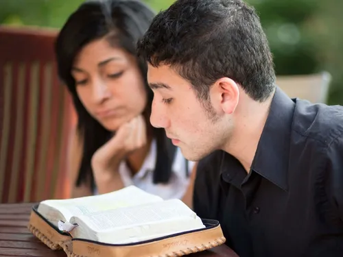 youth reading the scriptures