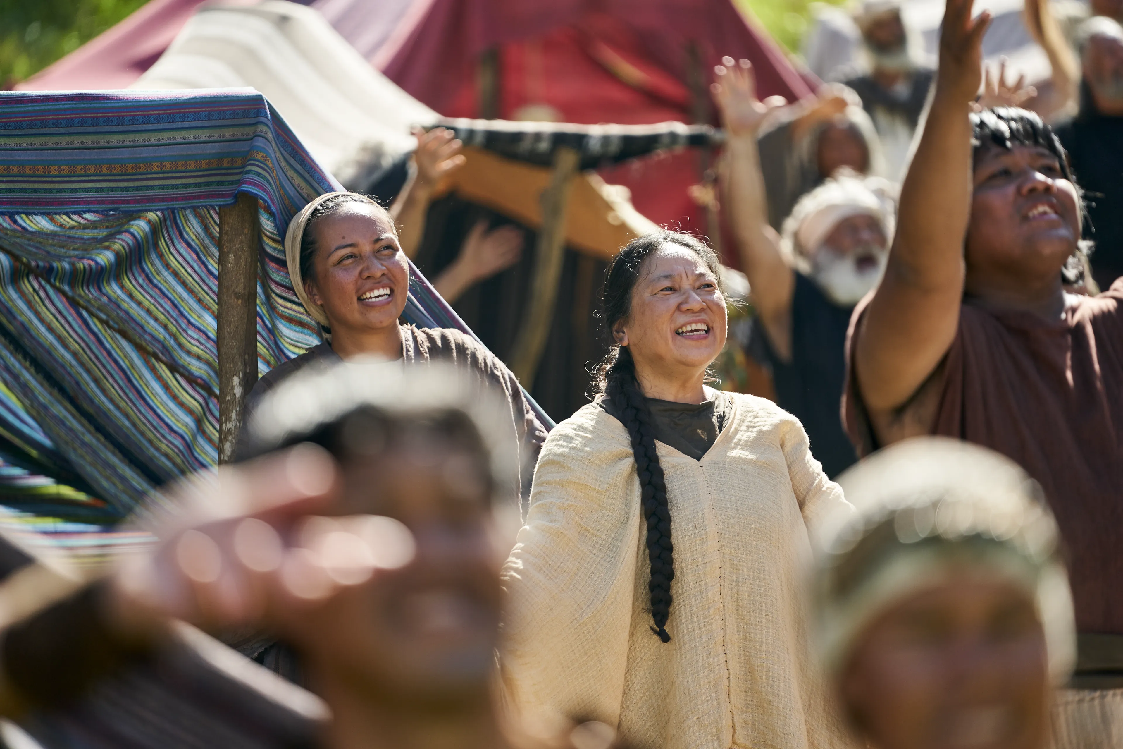 Men and women gather to listen to King Benjamin in the Land of Zarahemla.