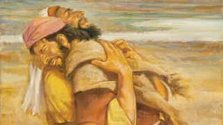 The Old Testament characters Jacob and Esau embracing one another. A desert landscape is portrayed in the background.