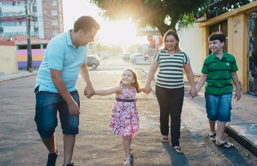 family walking and holding hands