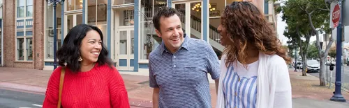 women and man talking