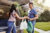Couple unloading groceries