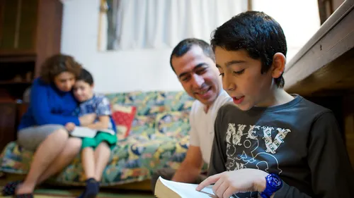 family reading scriptures together