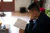 young man reading scriptures