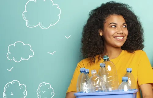 young woman holding a plastic container with bottles