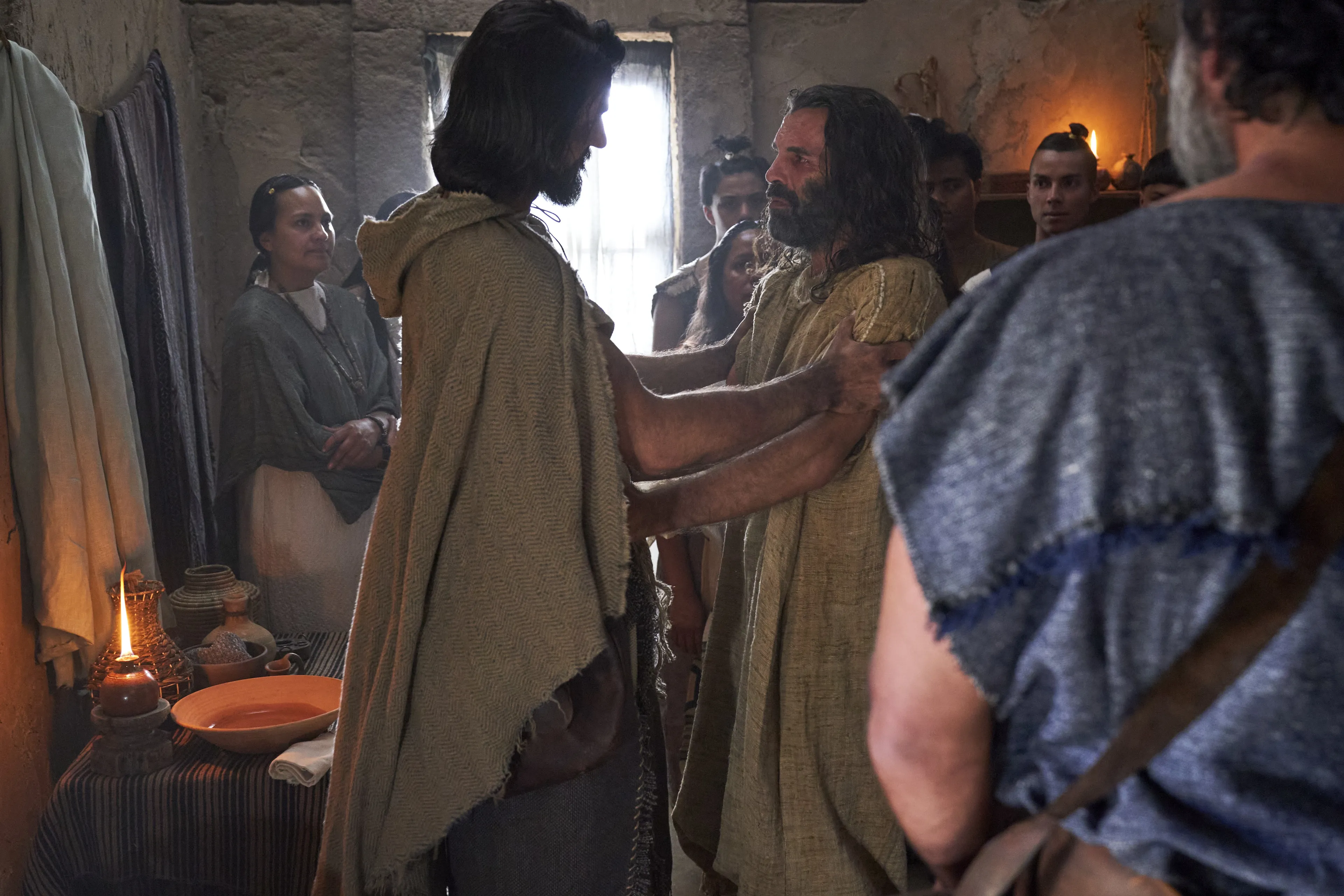 Zeezrom greets Alma the Younger after being healed by him in the land of Shilom.