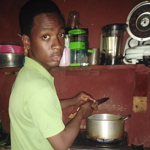 young man cooking