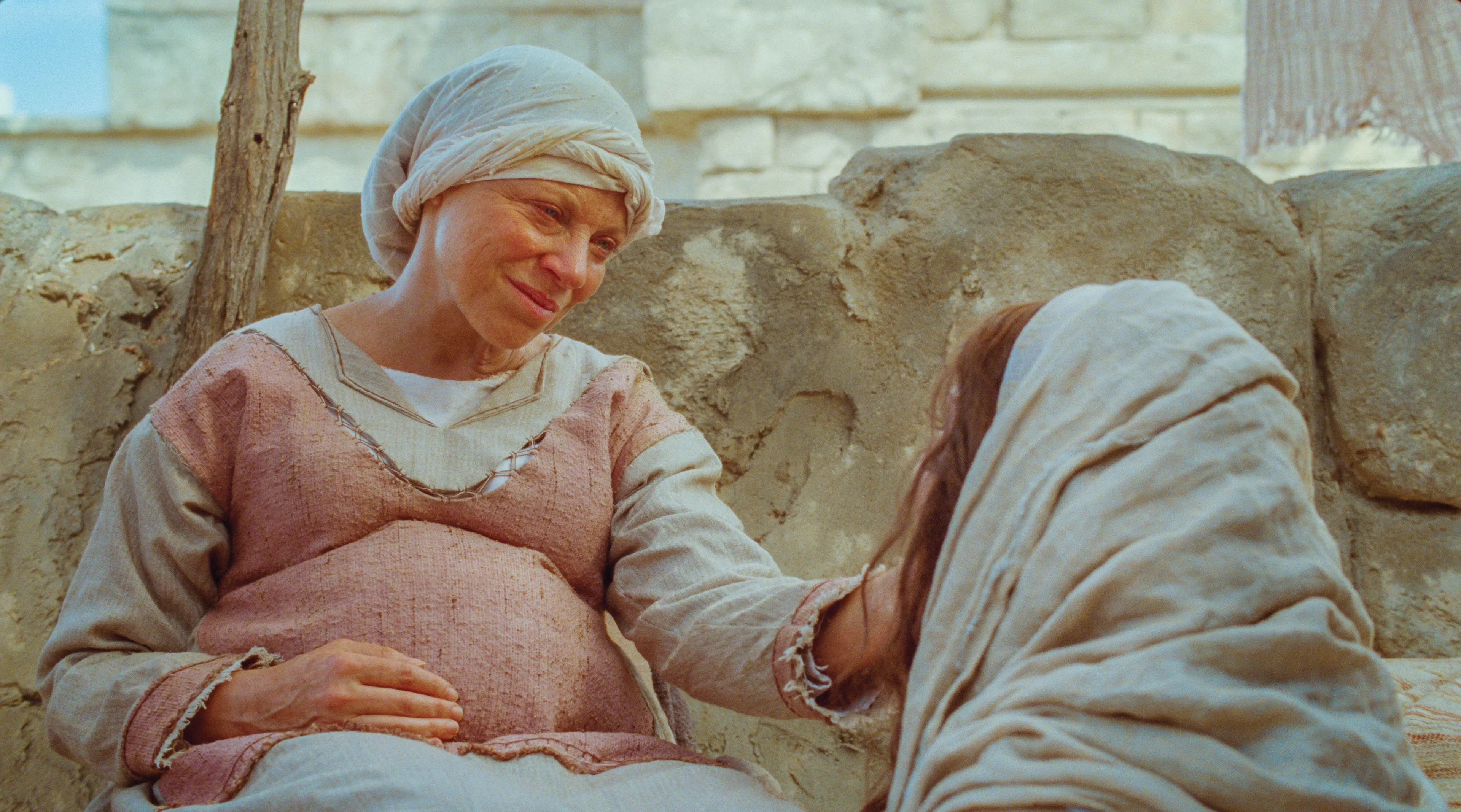Mary visiting her cousin Elisabeth, who is also expecting a child.