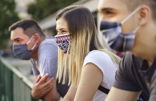 Young adults wearing masks