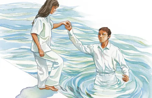 girl entering baptismal font