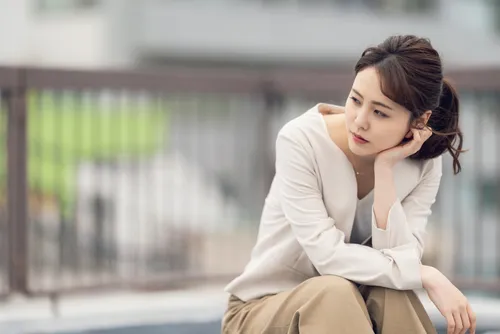 young woman looking to the side