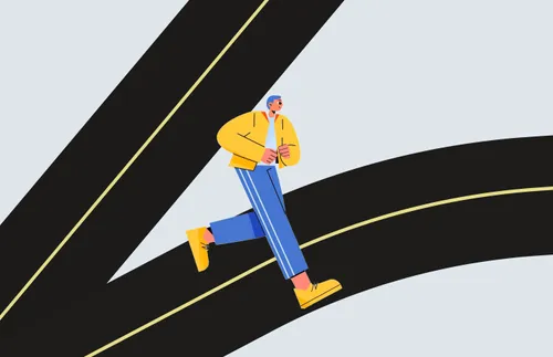 man choosing a direction to walk at a fork in the road