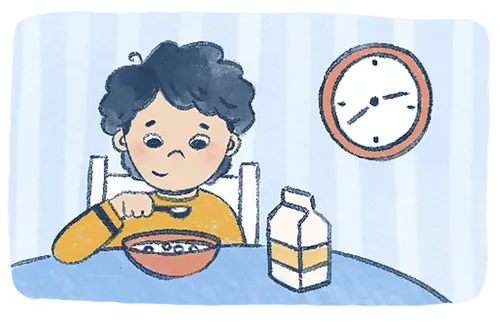 Boy eating breakfast