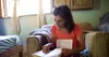 woman studying scriptures at home