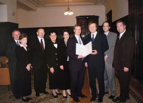 Elder Bednar with members in church