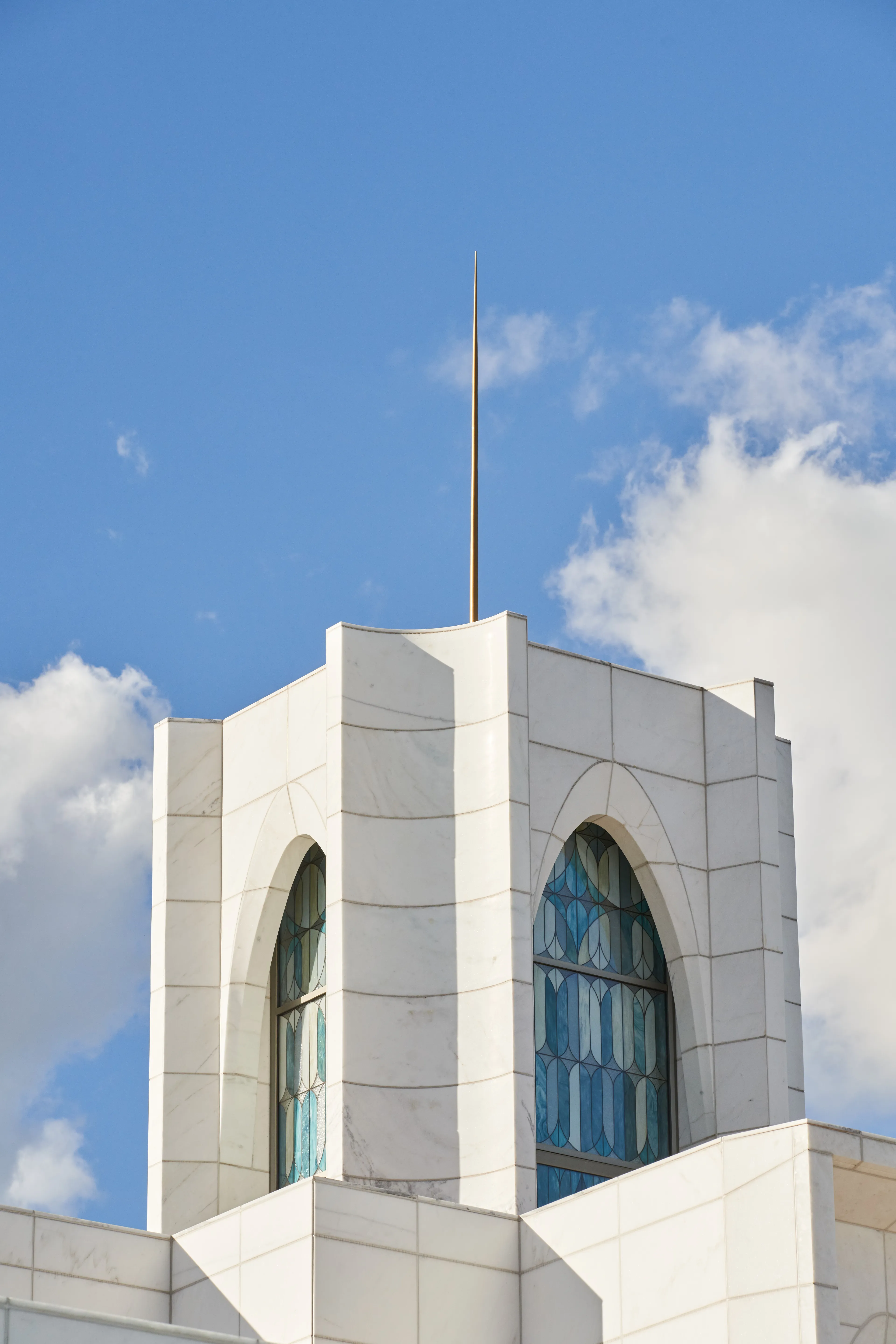 Exterior of the Brasilia Brazil Temple. It features the top of the temple with its spire. Image was taken during the day.