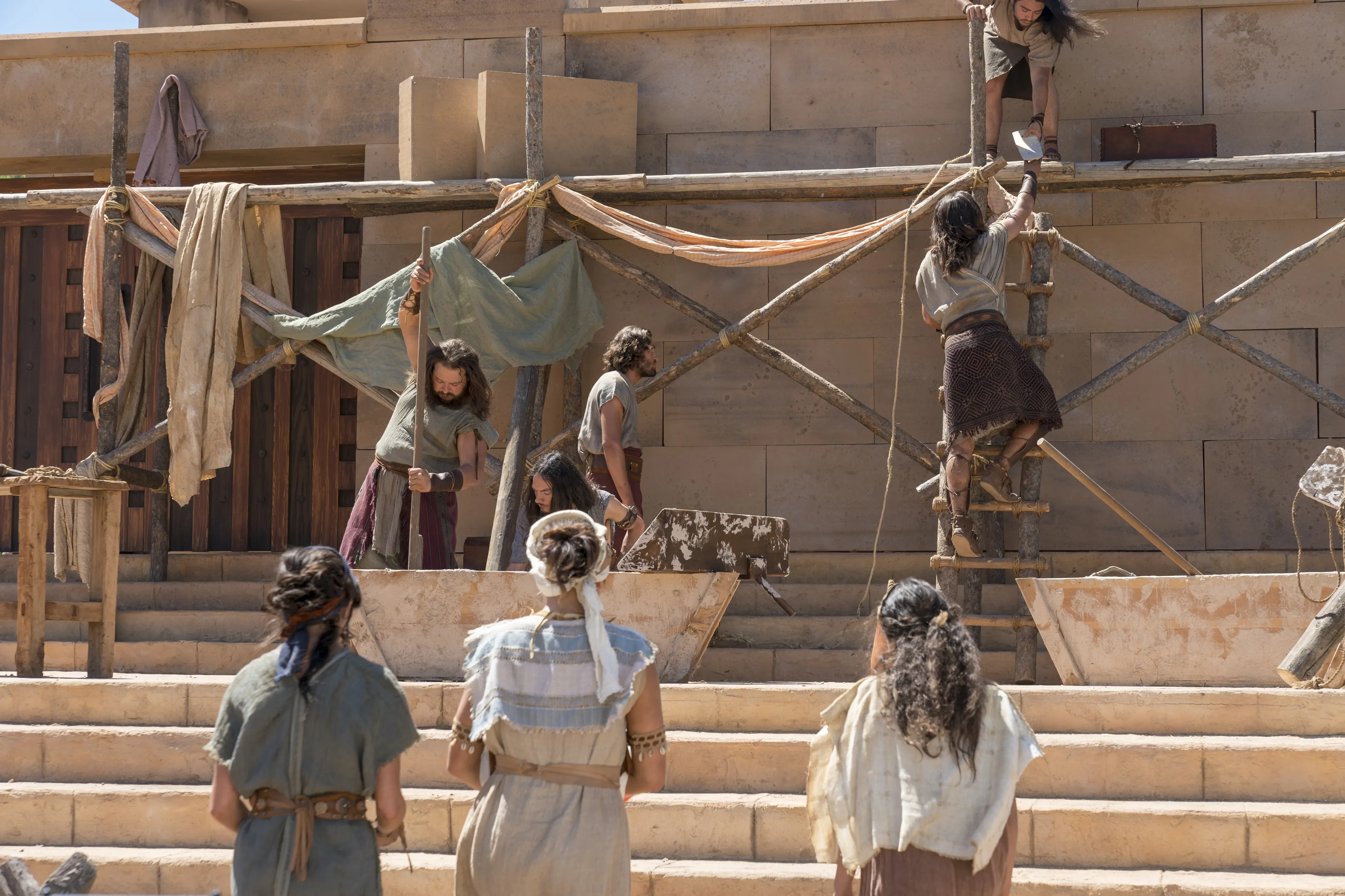 Various Nephites come together to build the temple in the Land of Nephi.