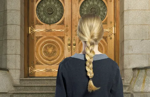 young woman facing temple