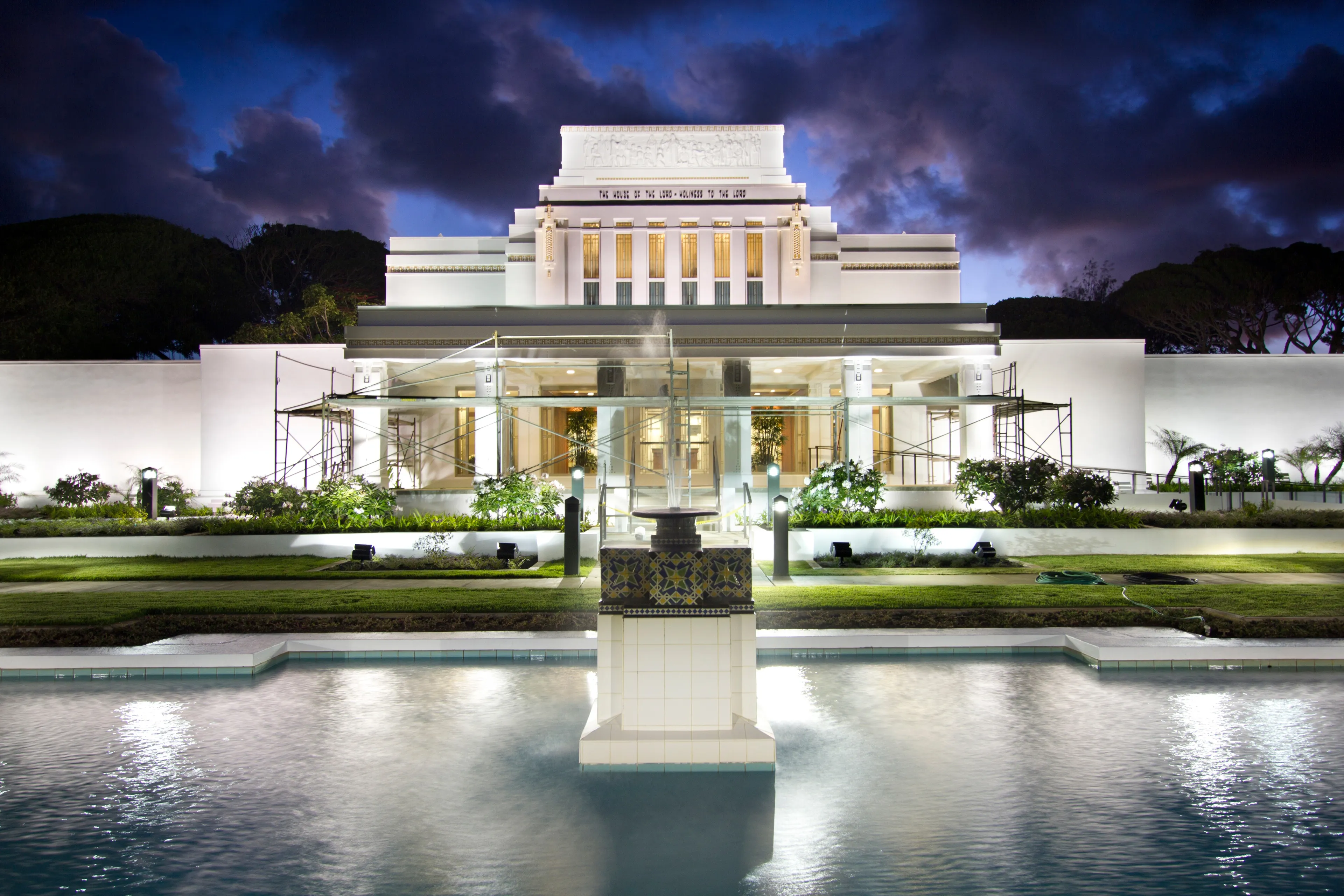 The Laie Hawaii Temple reflection pond, including the fountain and scenery.  