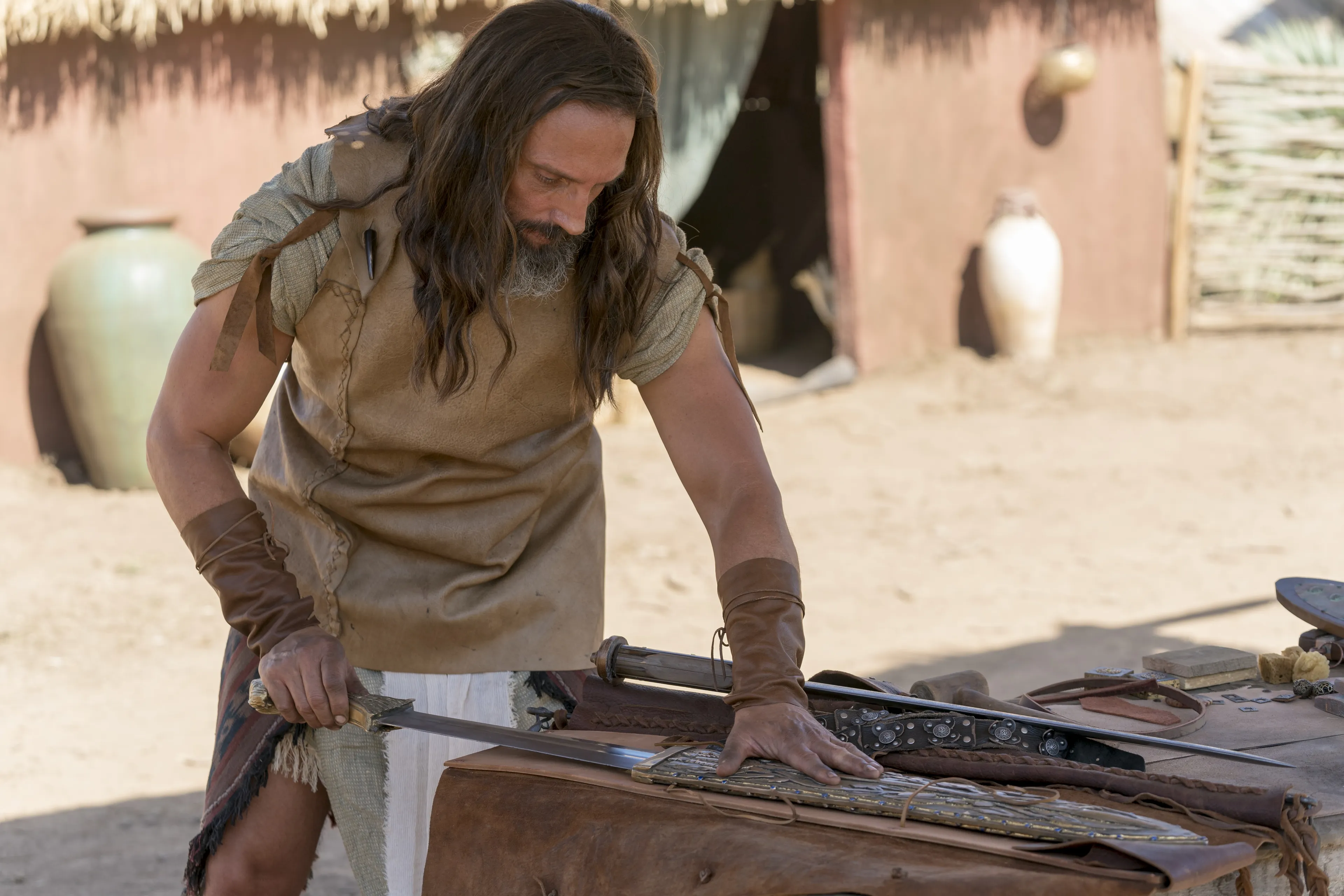 Older Nephi with the sword of Laban.