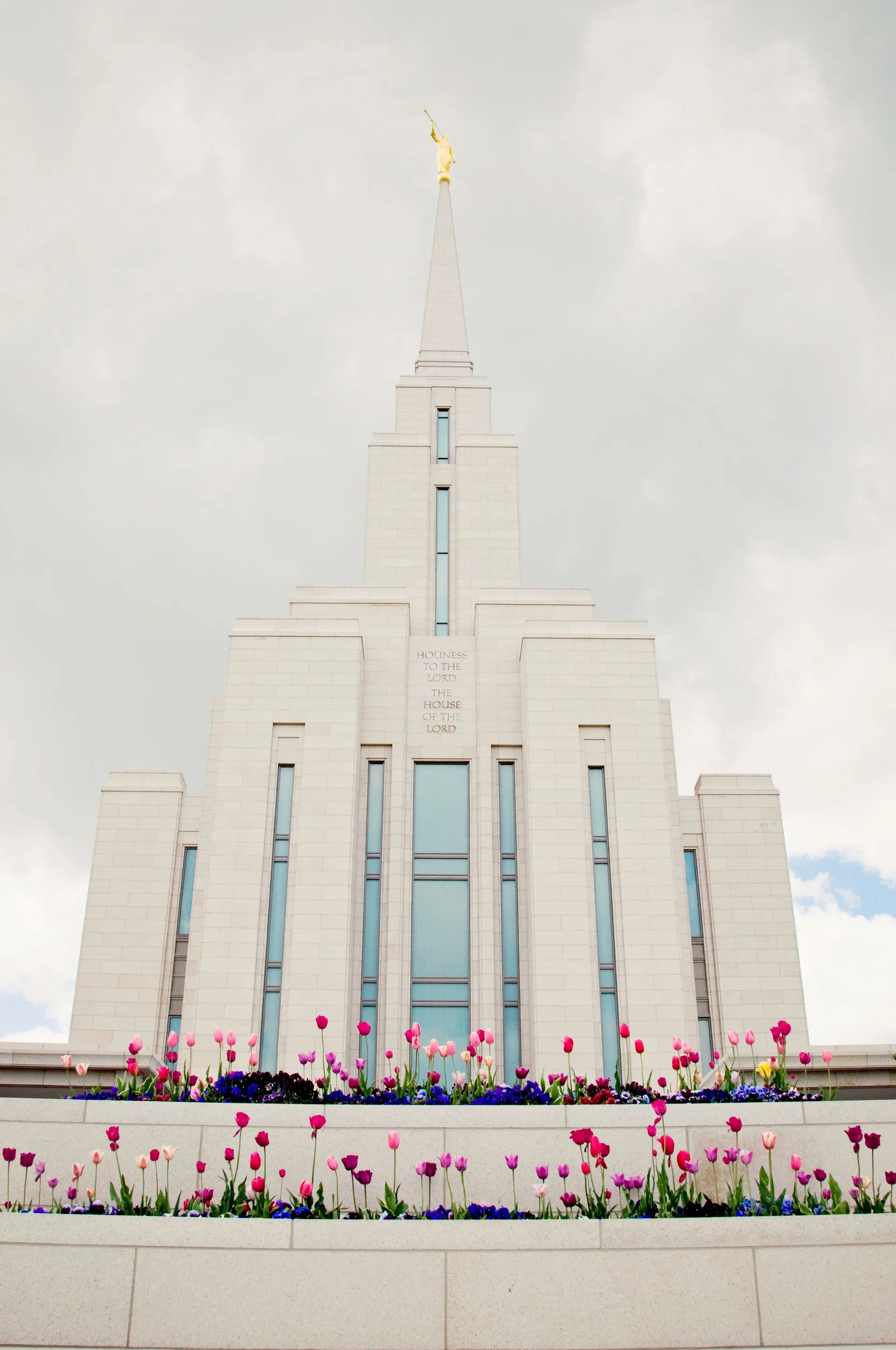 The Oquirrh Mountain Utah Temple in the spring, including scenery.
