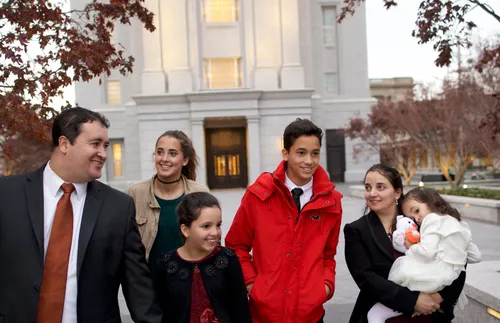 family in front of temple