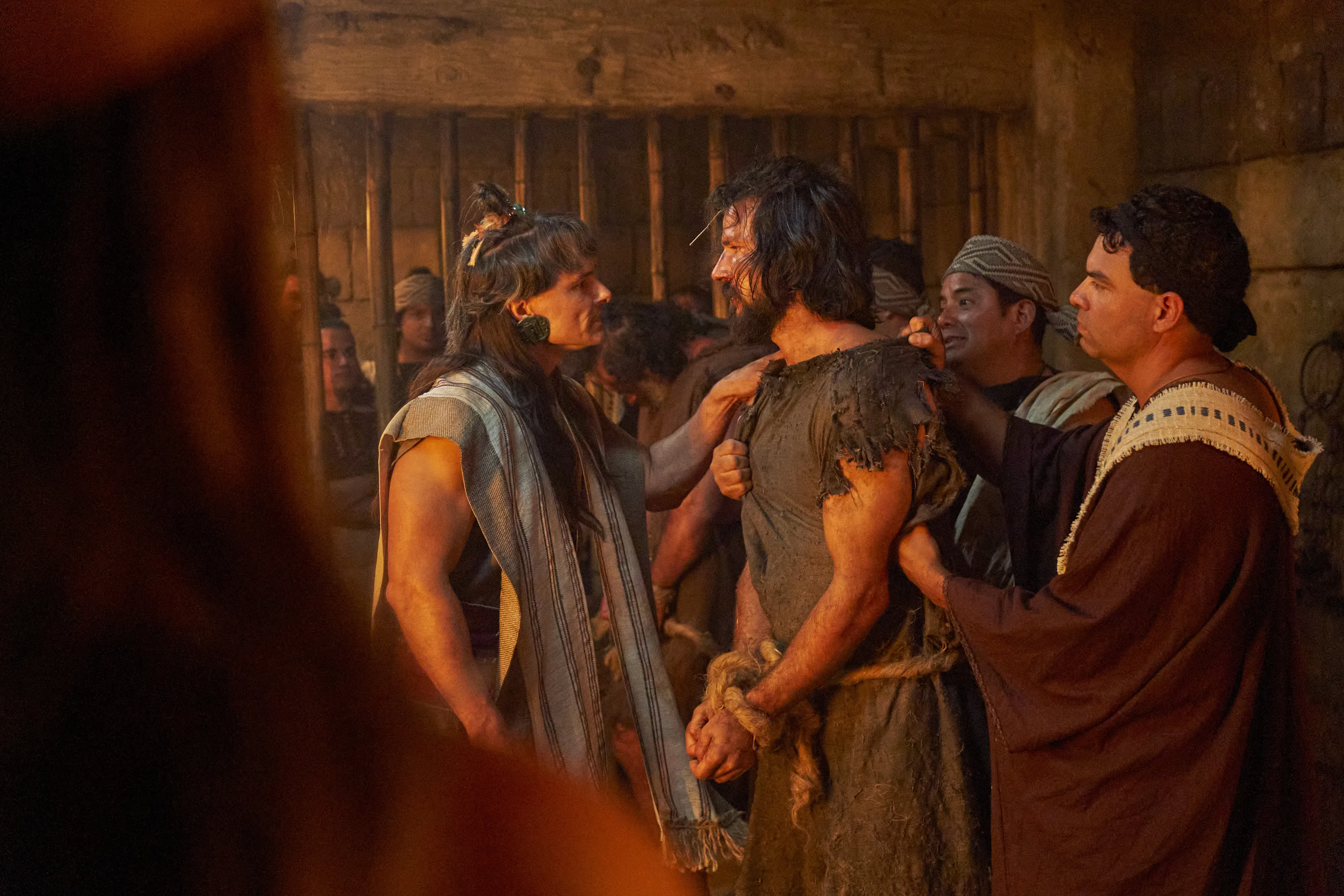 Alma the Younger and Amulek are mocked by the lawyers of Ammonihah while imprisoned.