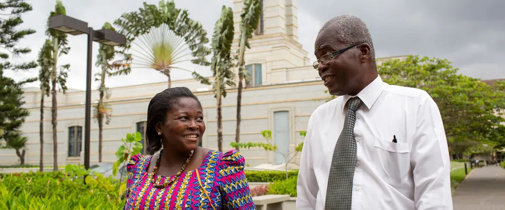 A couple walking outside the Accra Ghana Temple