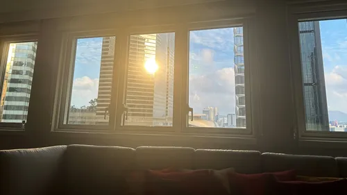 Sun reflecting off building