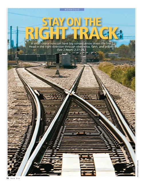A photograph of a train track diverging in two directions near a train yard, paired with the words “Stay on the Right Track.”