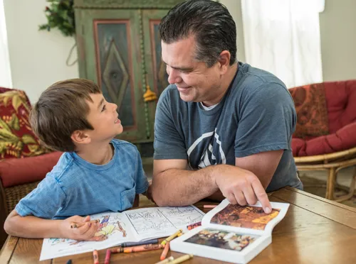 a father teaching his son the gospel
