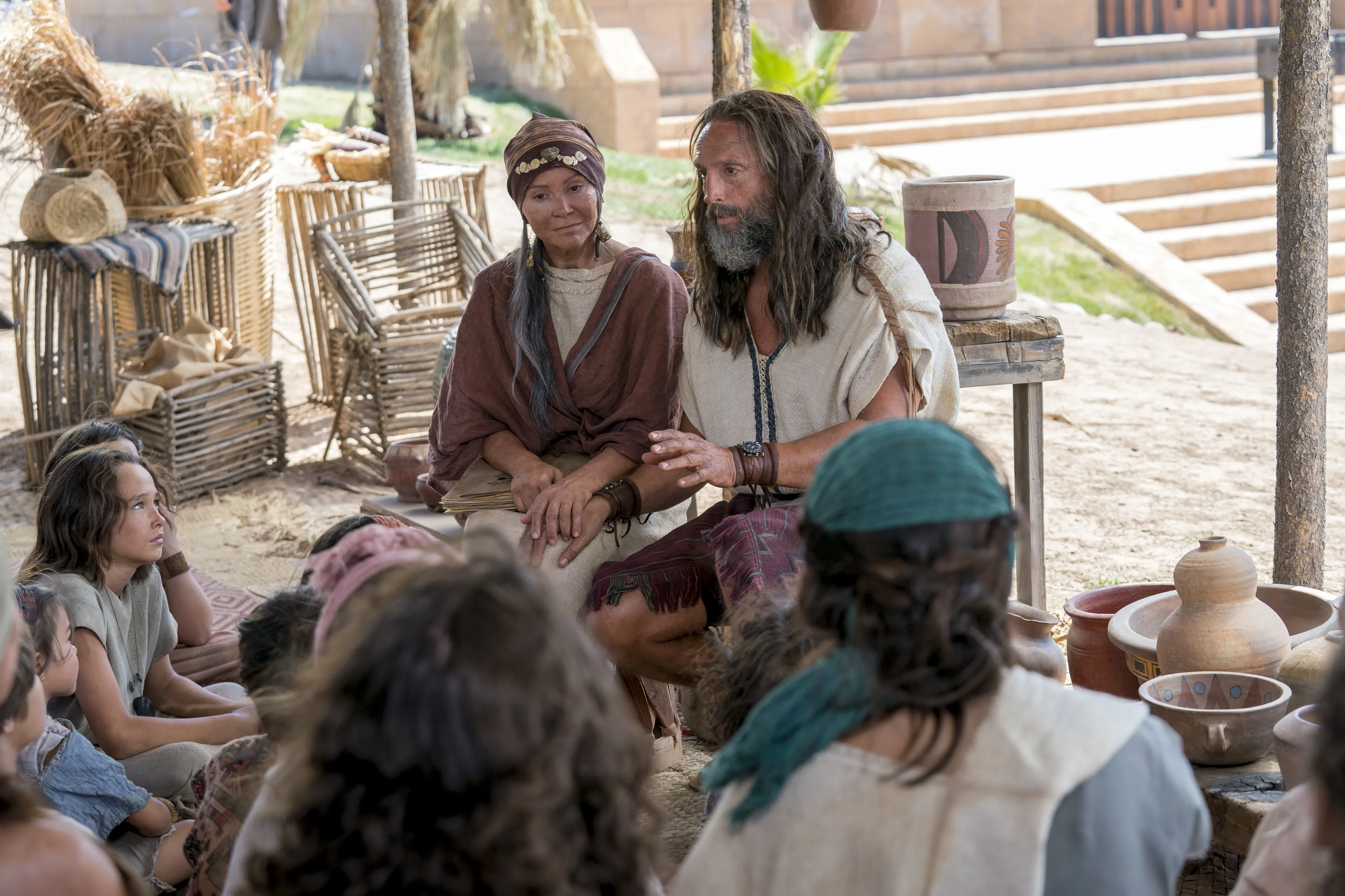 Children listen as Nephi teaches.