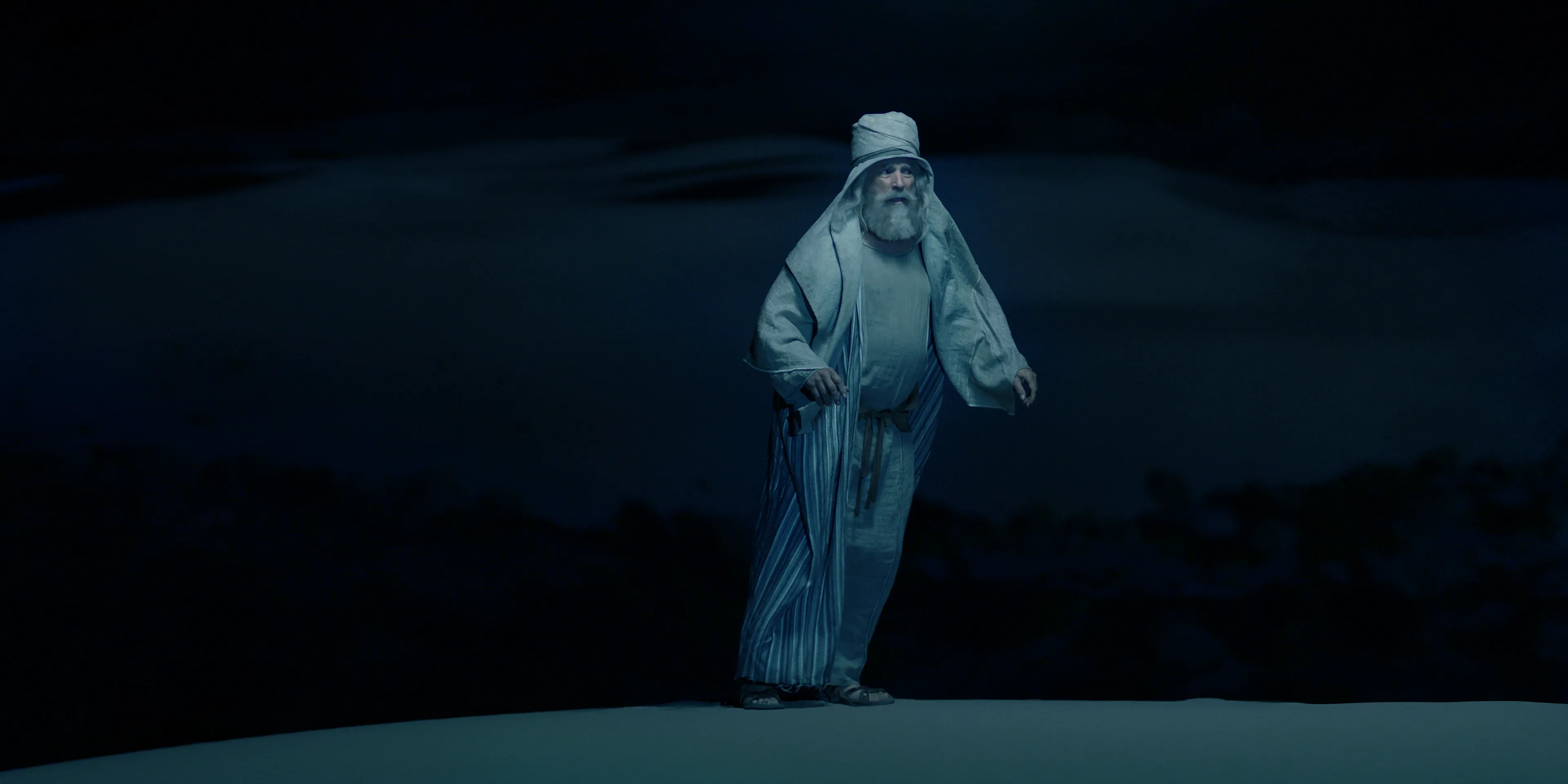 Lehi walks through darkness in his vision of the tree of life.