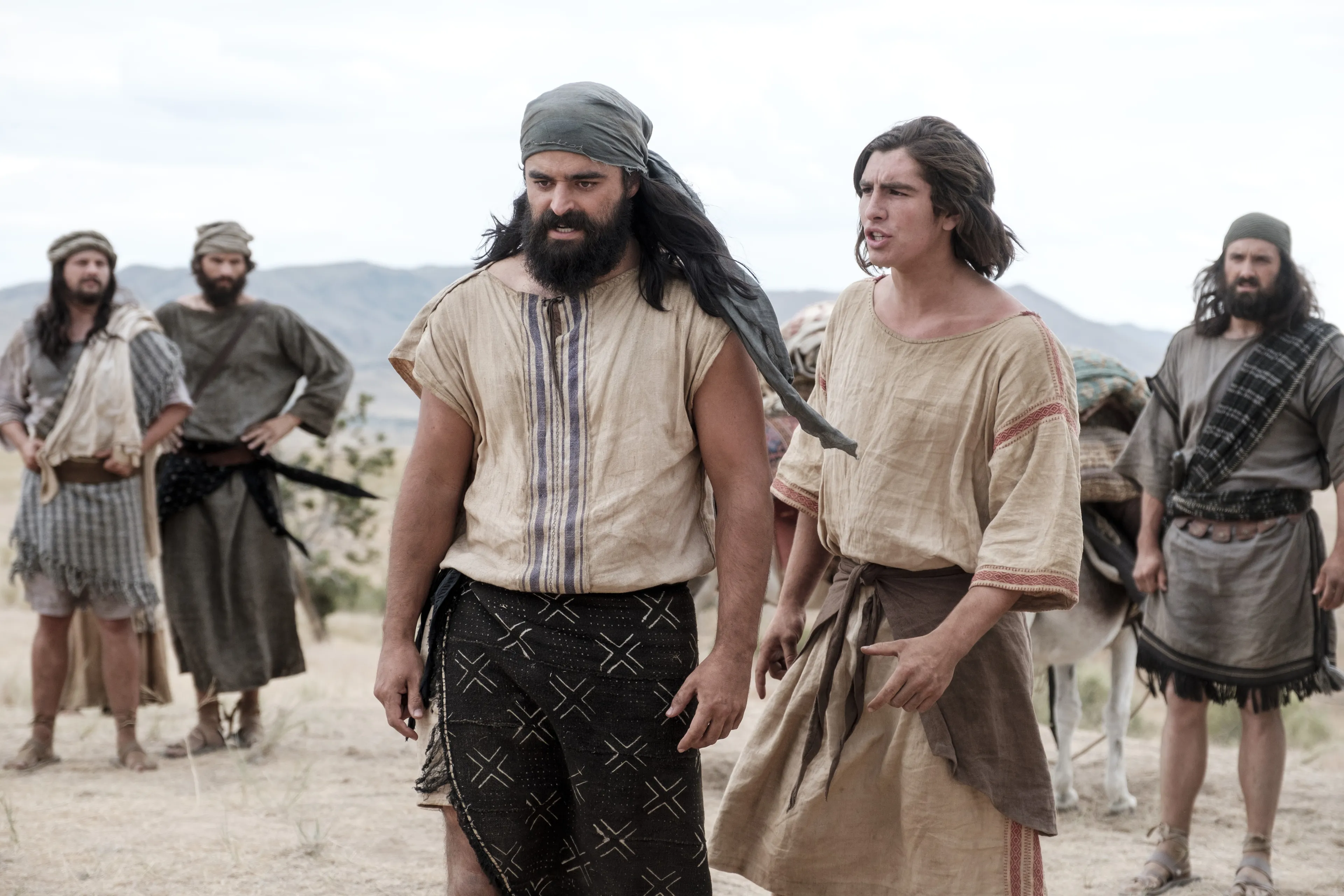 Nephi and Laman argue in the wilderness.