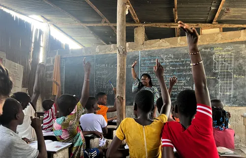 students participating in class in Lomé, Togo