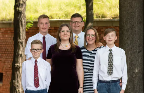 family standing together outdoors
