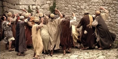 1 Corinthians 13, Paul is stoned by men upset by his teachings