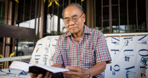 man studying scriptures