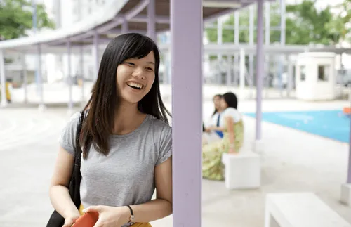 a young woman smiling
