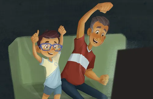 father and son watching sports together