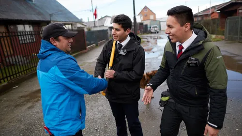 missionaries greeting man