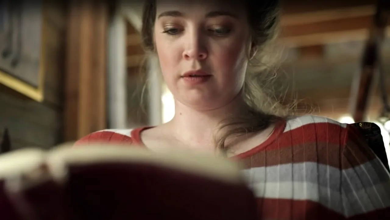 A woman studies the Holy Bible