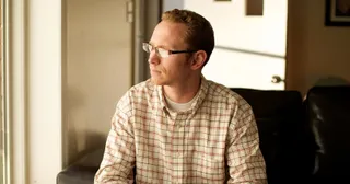 a young adult ponders